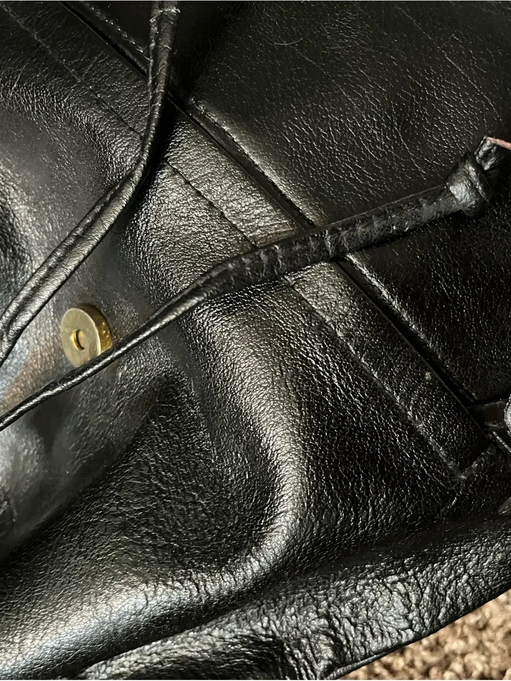 JJs House Black Leather Drawstring Flap Backpack